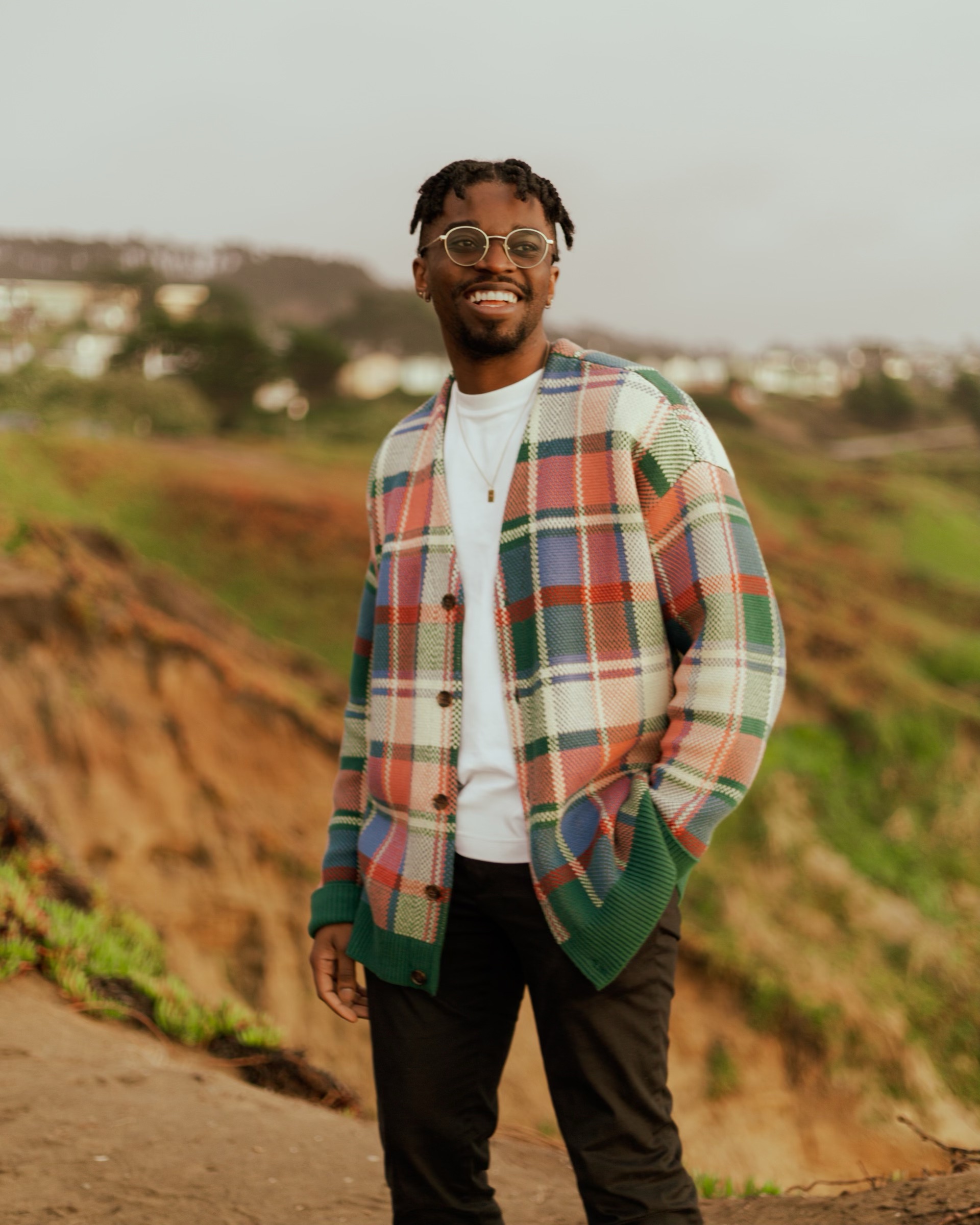 Yannick Matia smiling on the California coast